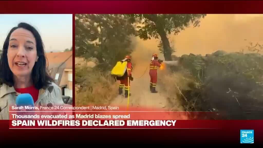 'it smells of burning': thousands evacuated as wildfires rage around madrid