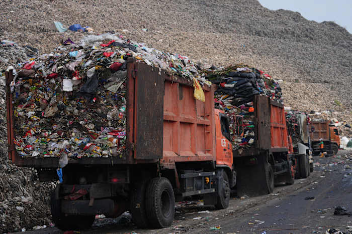 as indonesia cuts methane emissions, life atop a mountain of garbage begins to change