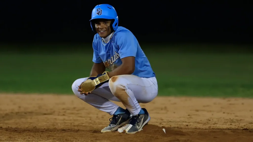 mariners sign record setting outfielder who played division i football