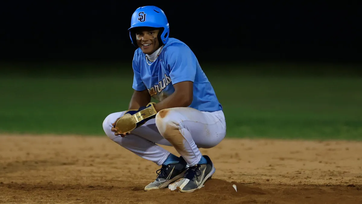 mariners sign record setting outfielder who played division i football