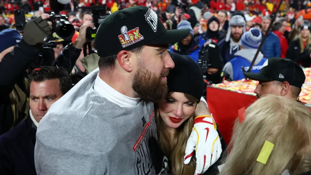travis kelce's reaction to taylor swift walking down the aisle revealed