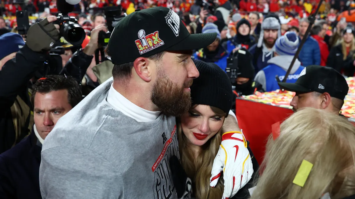 travis kelce's reaction to taylor swift walking down the aisle revealed