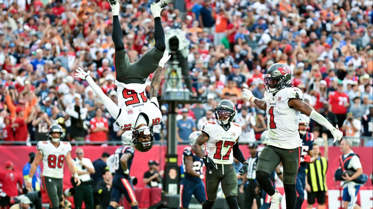 buccaneers put viral bison flipping video in crazy social media post of tez johnson