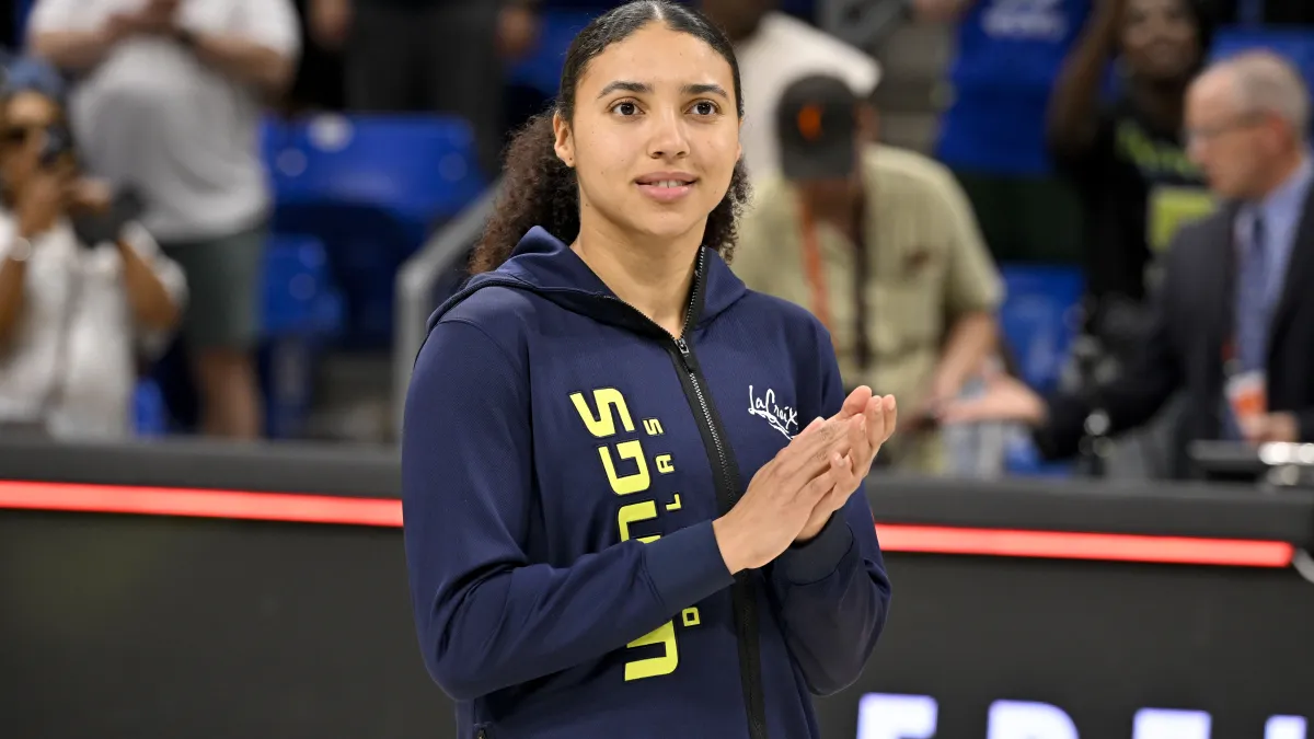 azzi fudd shows off glamorous look before making rare wnba history