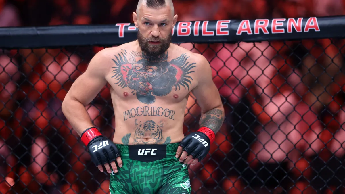what happened to conor mcgregor? legend appears to blow out knee in opening round of comeback vs. max holloway