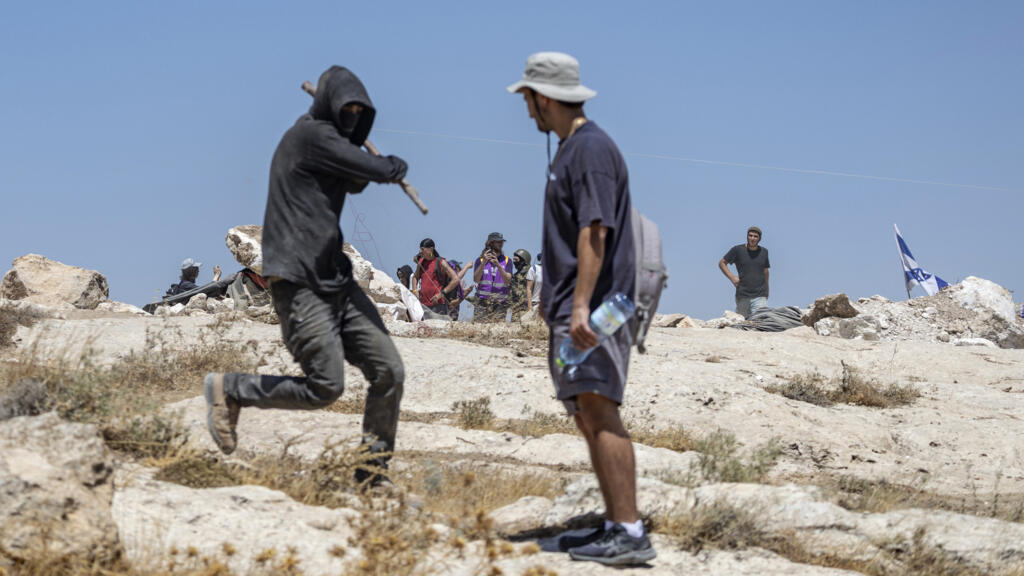 driven by faith, jewish activists stand up to settlers to protect west bank palestinians