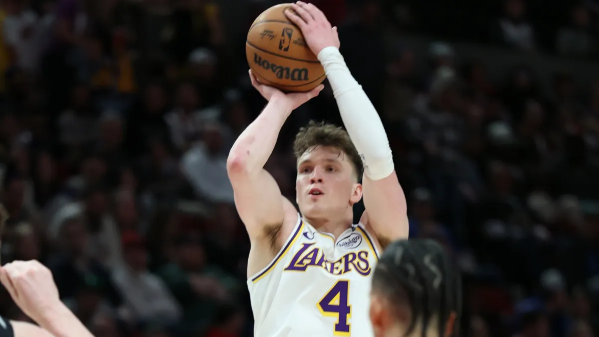 lakers trade idea ships dalton knecht, jarred vanderbilt for $46m nba champion in mega 3 team deal