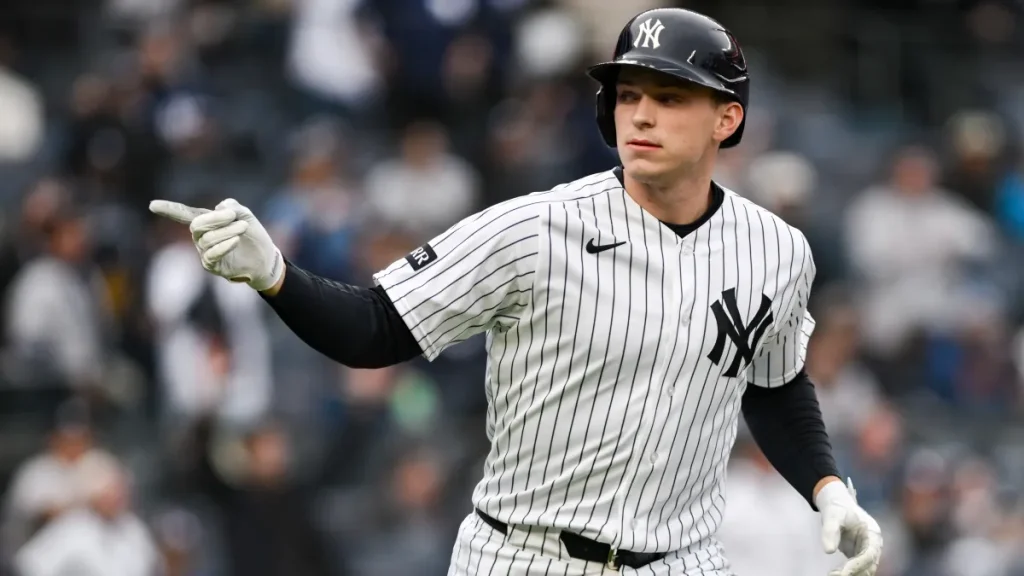 yankees stage dramatic comeback against braves to keep red sox at bay