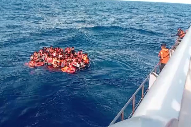 at least 1 dead, scores rescued from indonesian ferry that caught fire in rough seas near bali