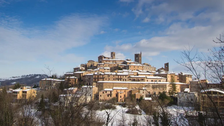 italy’s stunning region with handsome hill towns and mountain charm is more affordable than tuscany