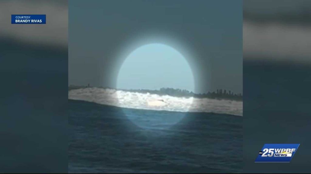 surfer, fishermen rescue 2 people and dog from capsized boat