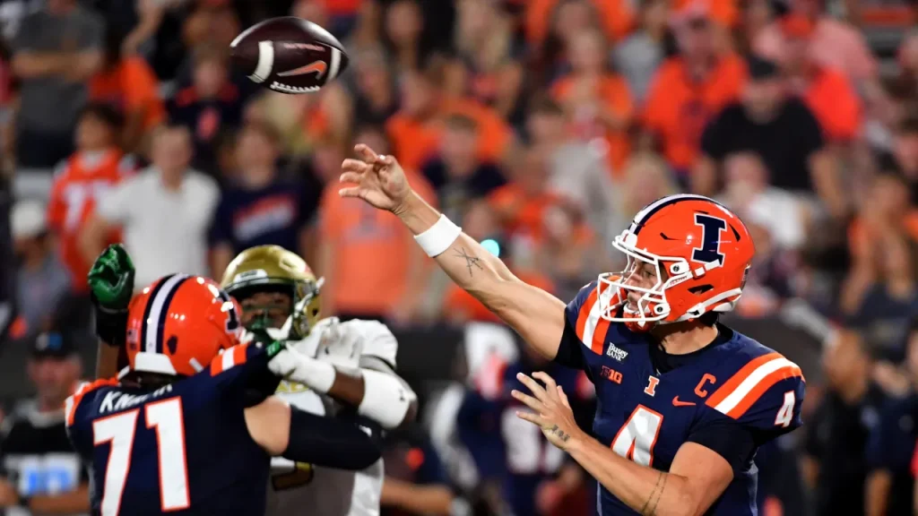 illinois pulls away from uab 42 23 behind explosive offense and late pick six