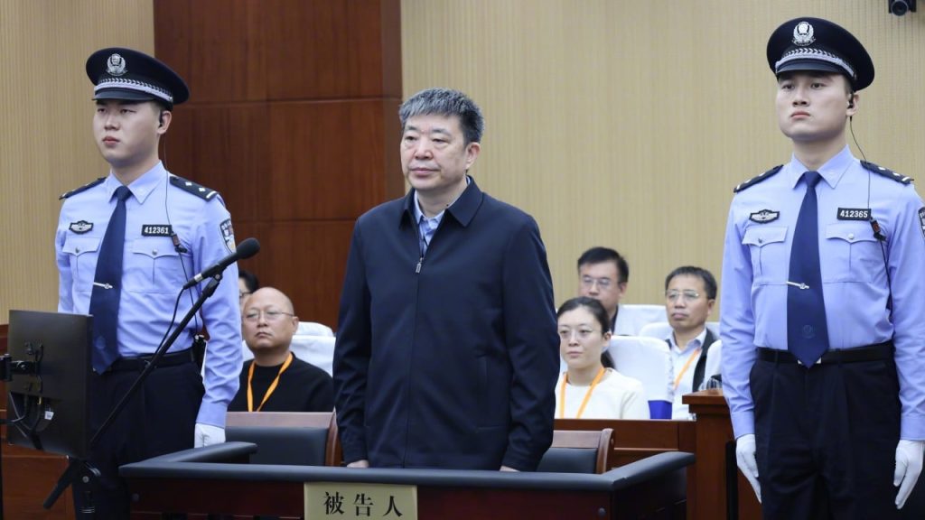 wuhan’s covid mayor zhou xianwang jailed for 14 years for corruption