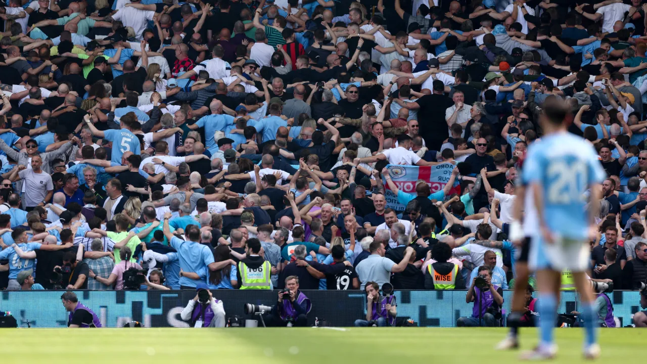 why do man city fans have inflatable bananas? retro fan craze for liverpool match at anfield explained