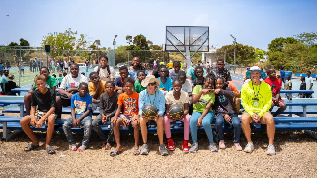 one team, one dream: how a nonprofit is transforming basketball in jamaica with help from nba star deandre ayton