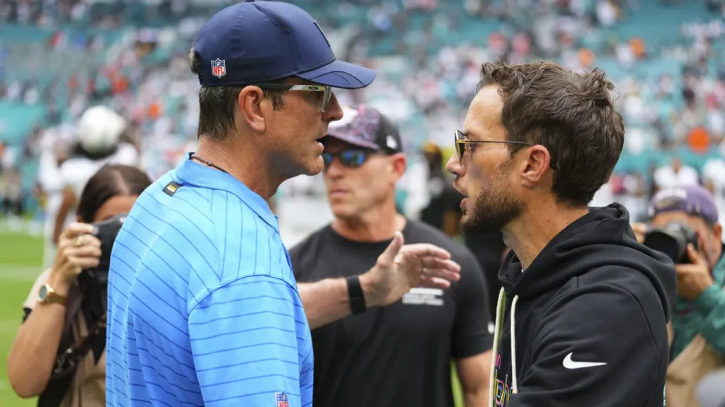 john harbaugh gives awkward answer to question about mike mcdaniel's job security after chargers' 0 4 start